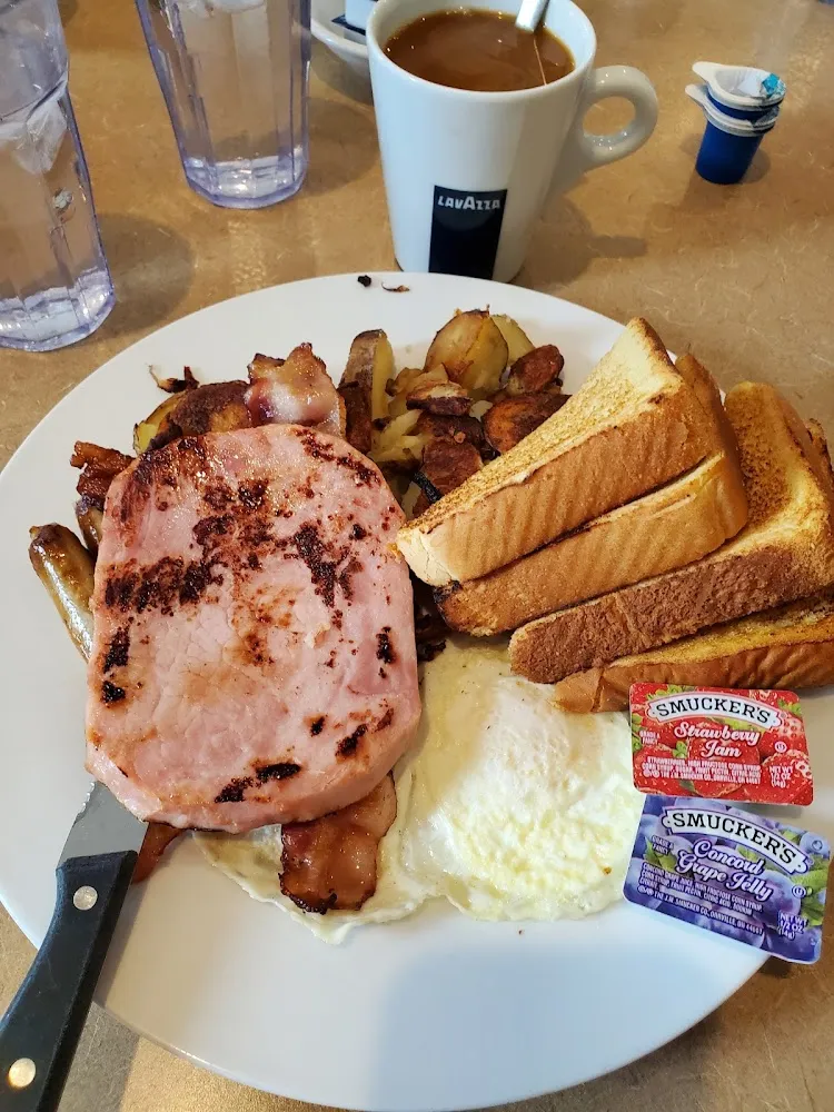 I Think It Was Called the Whole Pig Came with Big Piece of Ham 2 Bacon and 2 Sausage